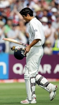 Cook walks back to the pavilion