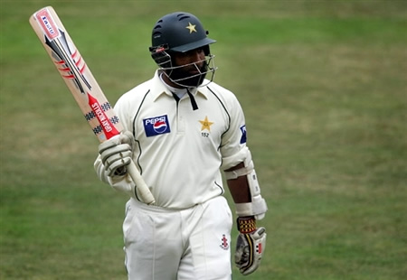 Mohammad Yousuf returns to the pavillion after being caught behind