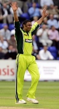 Shoaib Akhtar celebrates after taking the wicket of Clarke