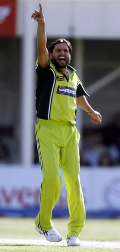Shahid Afridi celebrates after taking a wicket