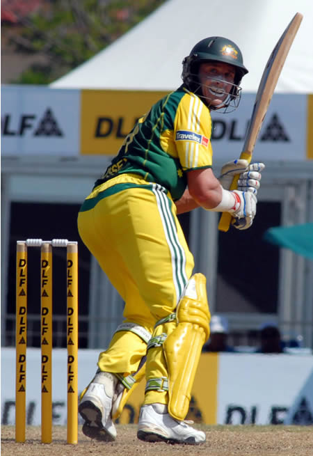 Hussey plays a shot