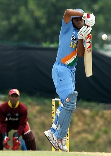 Raina tries to avoid a bouncer