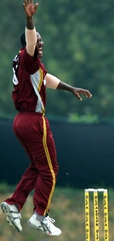 Smith celebrates after taking a wicket