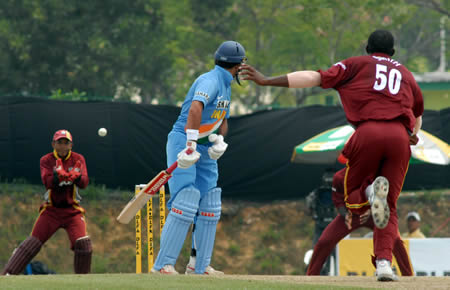 Baugh takes catch of Yuvraj on Smith's delivery