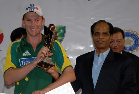 Brett Lee holds his 