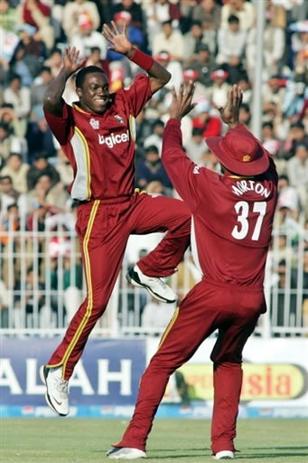 Taylor celebrates the wicket of Hafeez with Morton