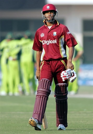 Simmons walks back to the pavilion after first ball duck