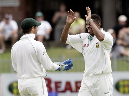 Makhaya Ntini & Mark Boucher celebrate the wicket of Imran Farhat