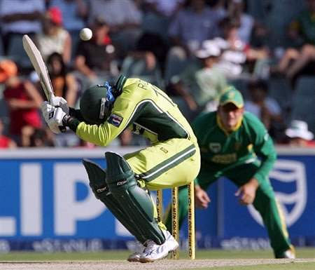 Abdul Razzaq avoids a bouncer