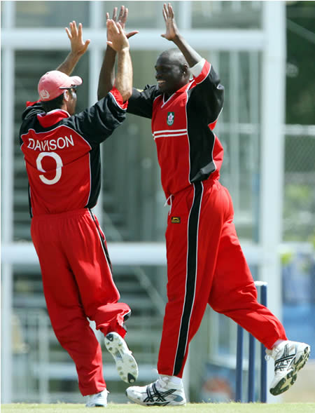 Henry Osinde & John Davison celebrate the wicket of Imran Nazir