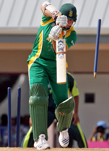 Graeme Smith is bowled by Umar Gul