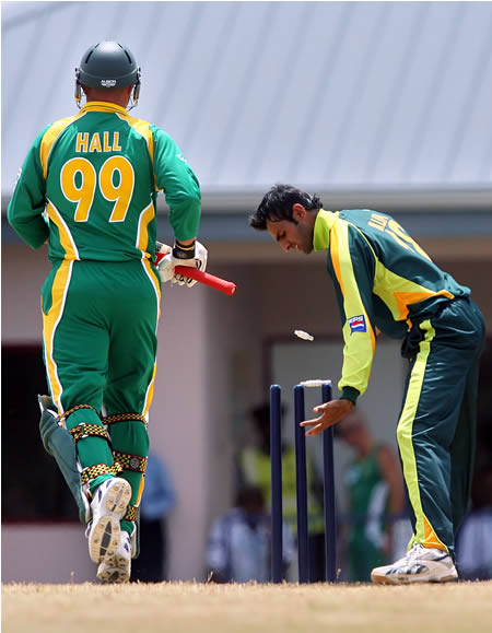 Andrew Hall is run out by Shoaib Malik