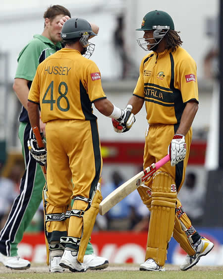 Andrew Symonds congratulates Mike Hussey after victory over Ireland