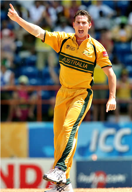 Shaun Tait celebrates the wicket of Fleming