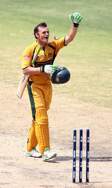 Adam Gilchrist celebrates his century