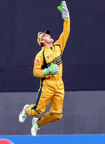 Adam Gilchrist celebrates the wicket of Tharanga