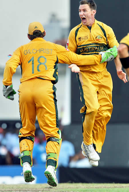 Hogg celebrates the wicket of Sangakkara