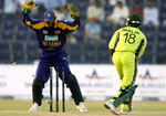 Shoaib Malik is bowled by Bandara