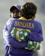 Bandara celebrates the wicket of Shoaib Malik with his teammate Prasanna Jayawardena