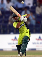 Kamran Akmal hits a boundary