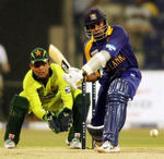 Mahela Jayawardene plays a sweep shot