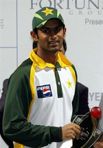 Shoaib Malik holds the winning trophy during the prize distribution ceremony