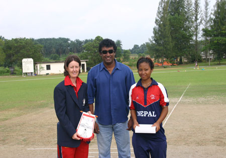 Hong Kong Women's and Nepal Women's Captains with Match referee after the toss