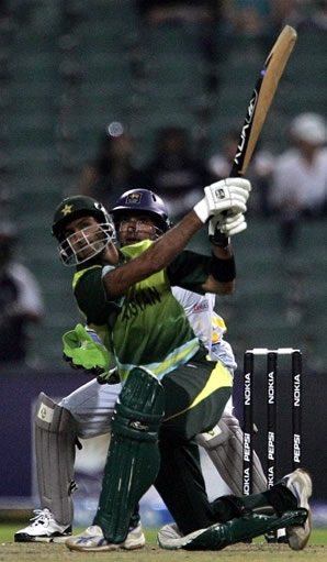 Shoaib Malik hits a six