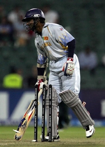 Kumar Sangakkara is bowled by Mohammad Asif