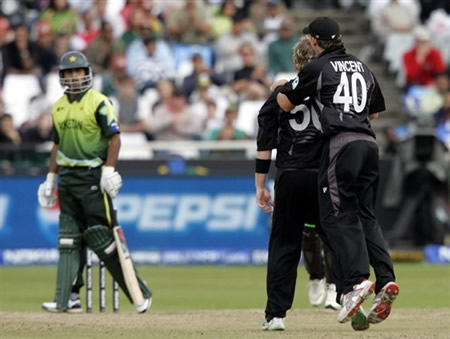 Styris and Vincent celebrate the wicket of Mohammad Hafeez