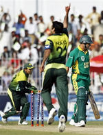 Charl Langeveldt is bowled by Iftikhar Anjum