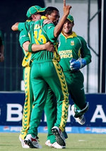 Makhaya Ntini celebrates the wicket of Kamran Akmal