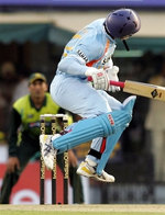 Yuvraj Singh avoids a bouncer