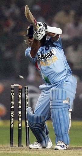 Sachin Tendulkar is bowled by Umar Gul