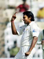 Danish Kaneria celebrates the wicket of Rahul Dravid