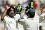 Mohammad Sami celebrates the wicket of Yuvraj Singh