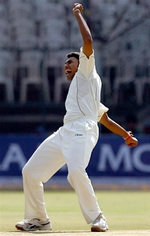 Danish Kaneria reacts after taking the wicket of Dravid