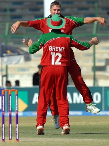 Ray Price celebrates the wicket of Mohammad Yousuf