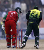 Taylor is bowled by Shoaib Malik