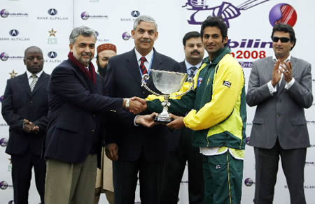 Shoaib Malik receives winning Trophy from PCB Chairman Dr. Nasim Ashraf