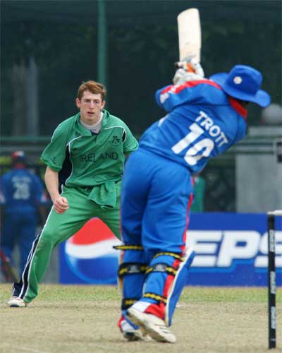 Greg Thompson bowls to Bermuda's Rodney Trott