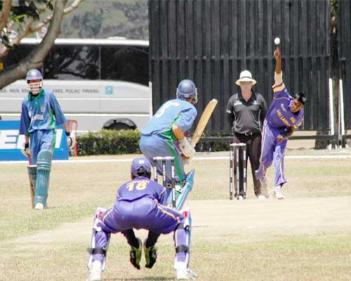 Denuman Fernando bowls to a Namibian batsman