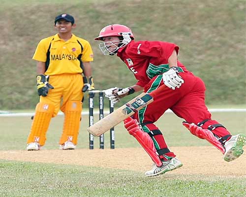 Peter Moor in action against Malaysia in the Plate match