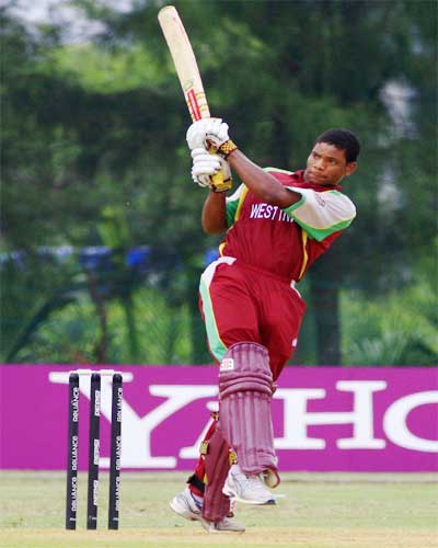 Kieran Powell hits the ball for a six against Nepal in the Plate final