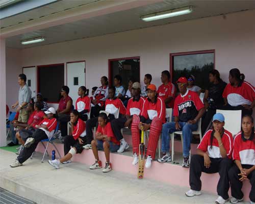 The Trinidad & Tobago players and entourage, including Larry Gomes, watching play against Canada last Thursday