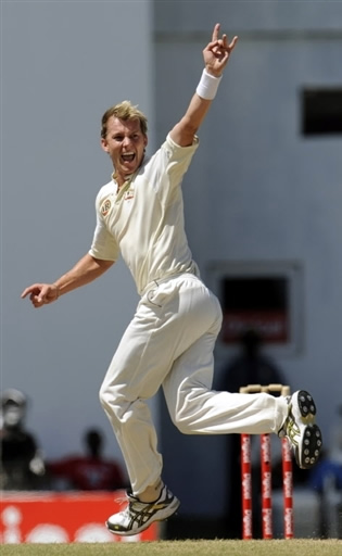 Brett Lee celebrates the wicket of Morton