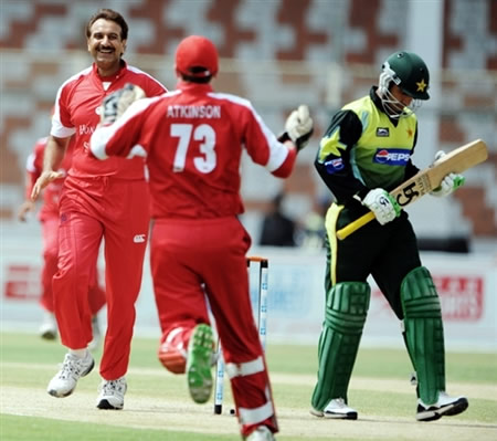 Afzaal Haider celebrates the wicket of Salman Butt