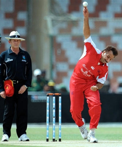 Afzaal Haider about to deliver the ball