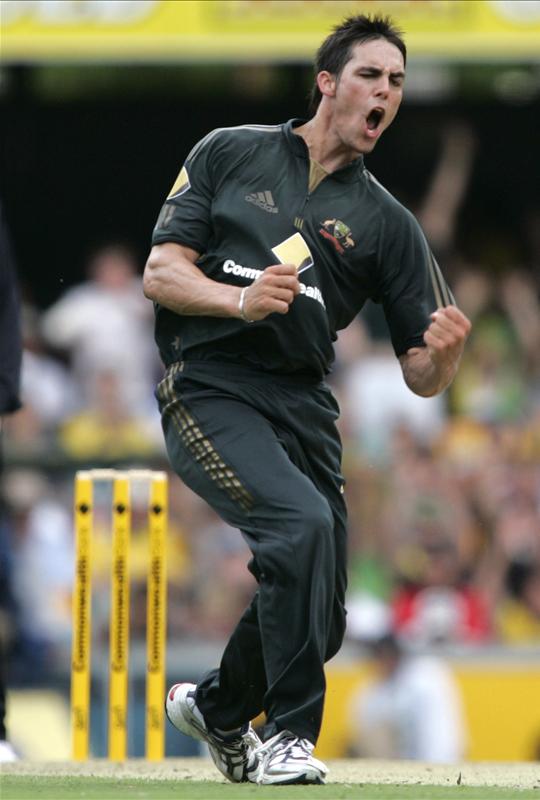 Mitchell Johnson celebrates getting the wicket of Gautam Gambhir