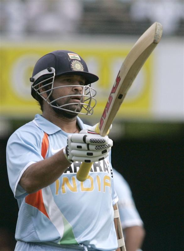 Sachin Tendulkar acknowledges the crowd after scoring his half century